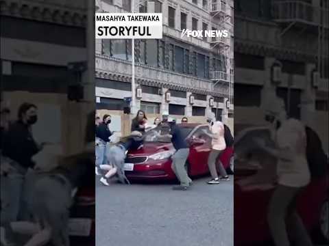 Driver runs over protester blocking LA intersection #shorts #foxnews #news #breakingnews #usa