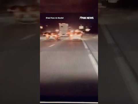 HIGHWAY HORROR: Footage captures the moment a truck plunges off an overpass