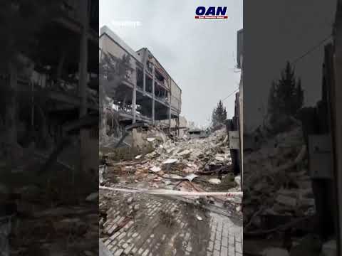 Destroyed buildings and rubble on the ground in Karaj, Iran