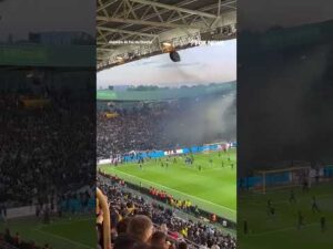WATCH: Professional soccer match is called off after angry fans storm the field