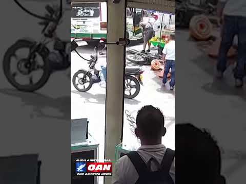 A speeding motorcyclist slams into a moving bus
